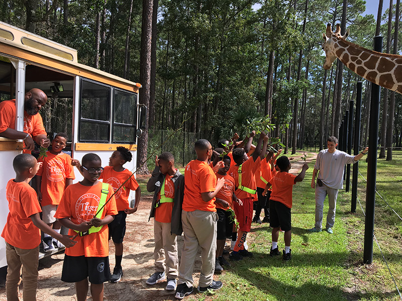 School aged kids go on a tour